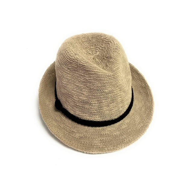 Beige straw hat with a black band on a white background