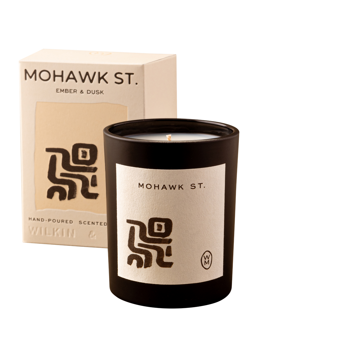 Mohawk St. candle and packaging on a white background