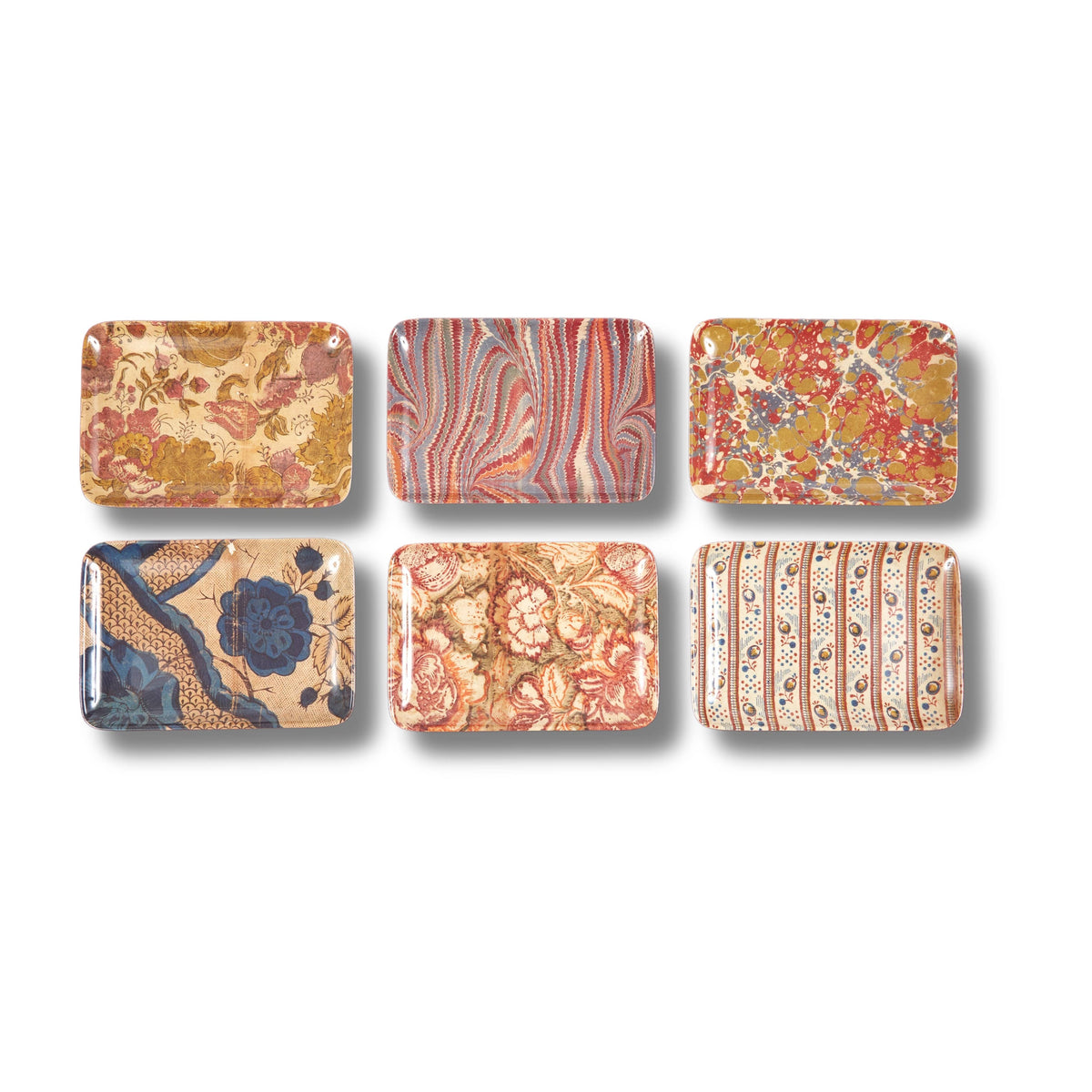Set of six decorative rectangular plates with various patterns on a white background