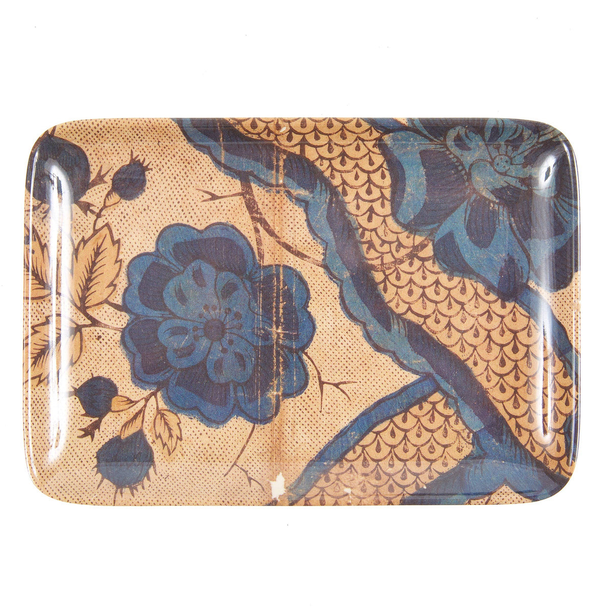 Decorative tray with floral and fish scale pattern on a beige background