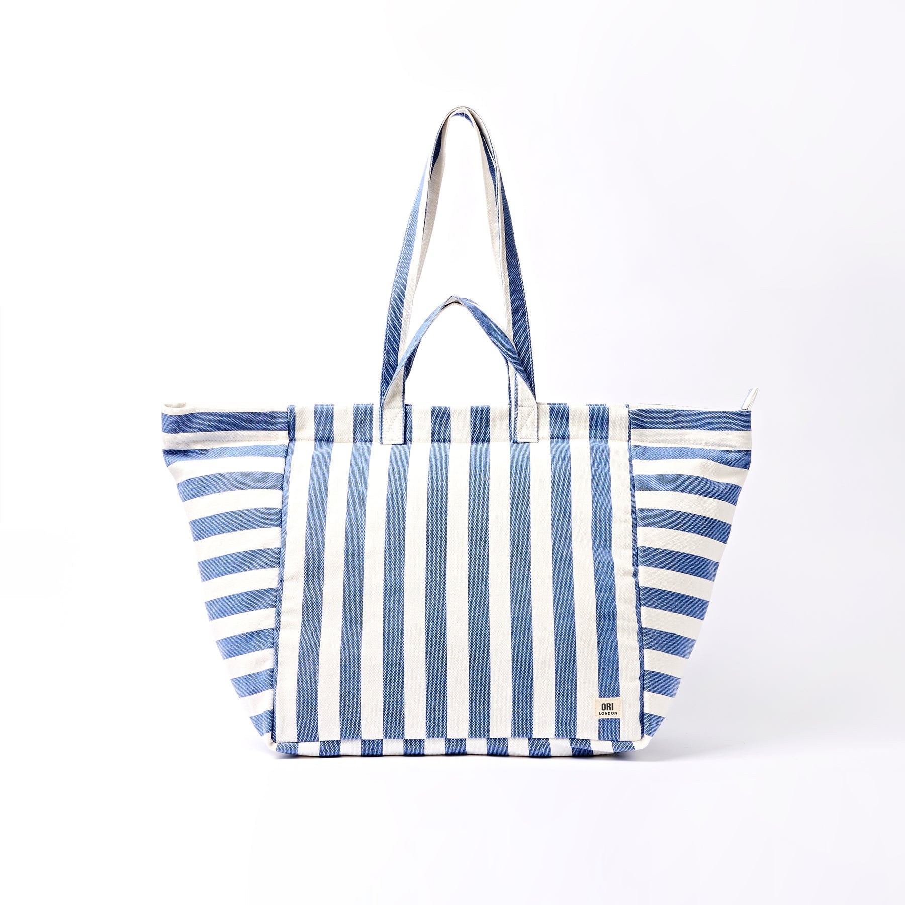 Blue and white striped tote bag on a white background
